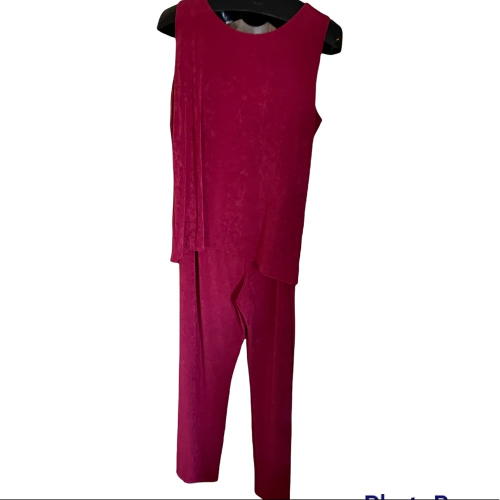 Pretty raspberry color! A Chico’s Travelers Size 2/12.